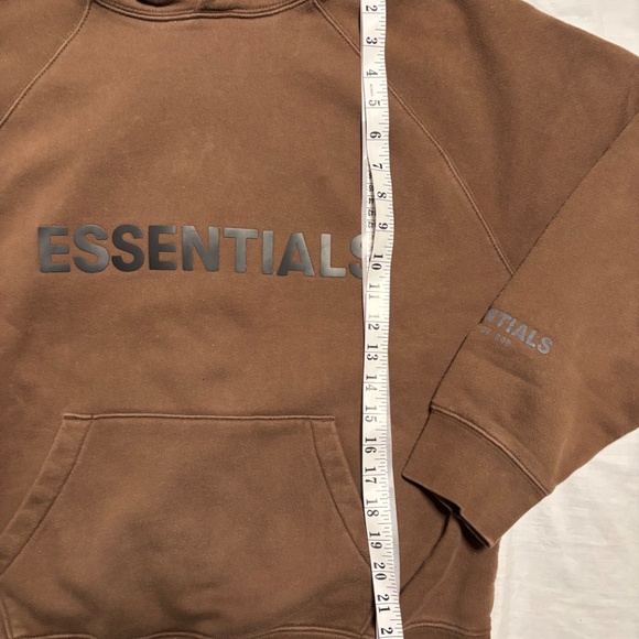 Essentials hoodie in dark brown Features front pocket and hood - Picture 9 of 11